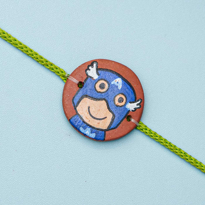 Hand-painted Captain America Terracotta Rakhi With Roli Chawal for Kids