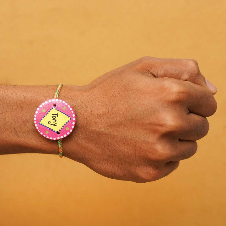 Personalized Terracotta Pink & Yellow Rakhi With Roli Chawal