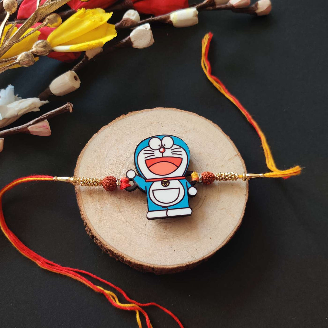 Handmade Printed Doraemon Wooden Rudraksha Rakhi With Roli Chawal