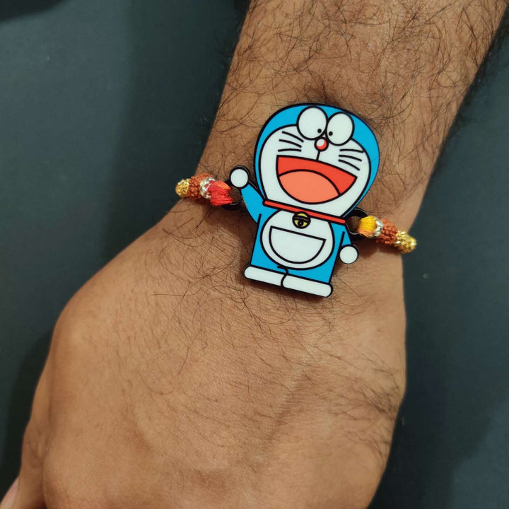 Handmade Printed Doraemon Wooden Rudraksha Rakhi With Roli Chawal