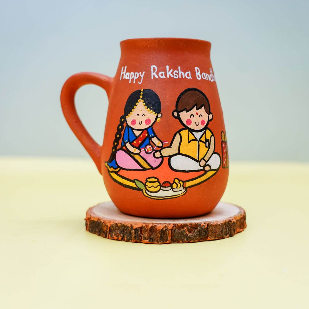 Personalized Handpainted Terracotta Mug for Rakshabandhan