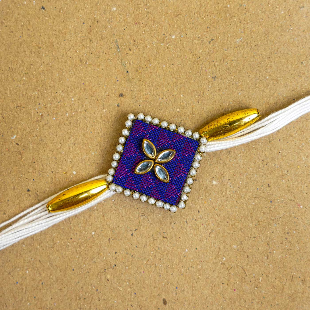 Handmade Purple Diamond Fabric & MDF Rakhi With Roli Chawal