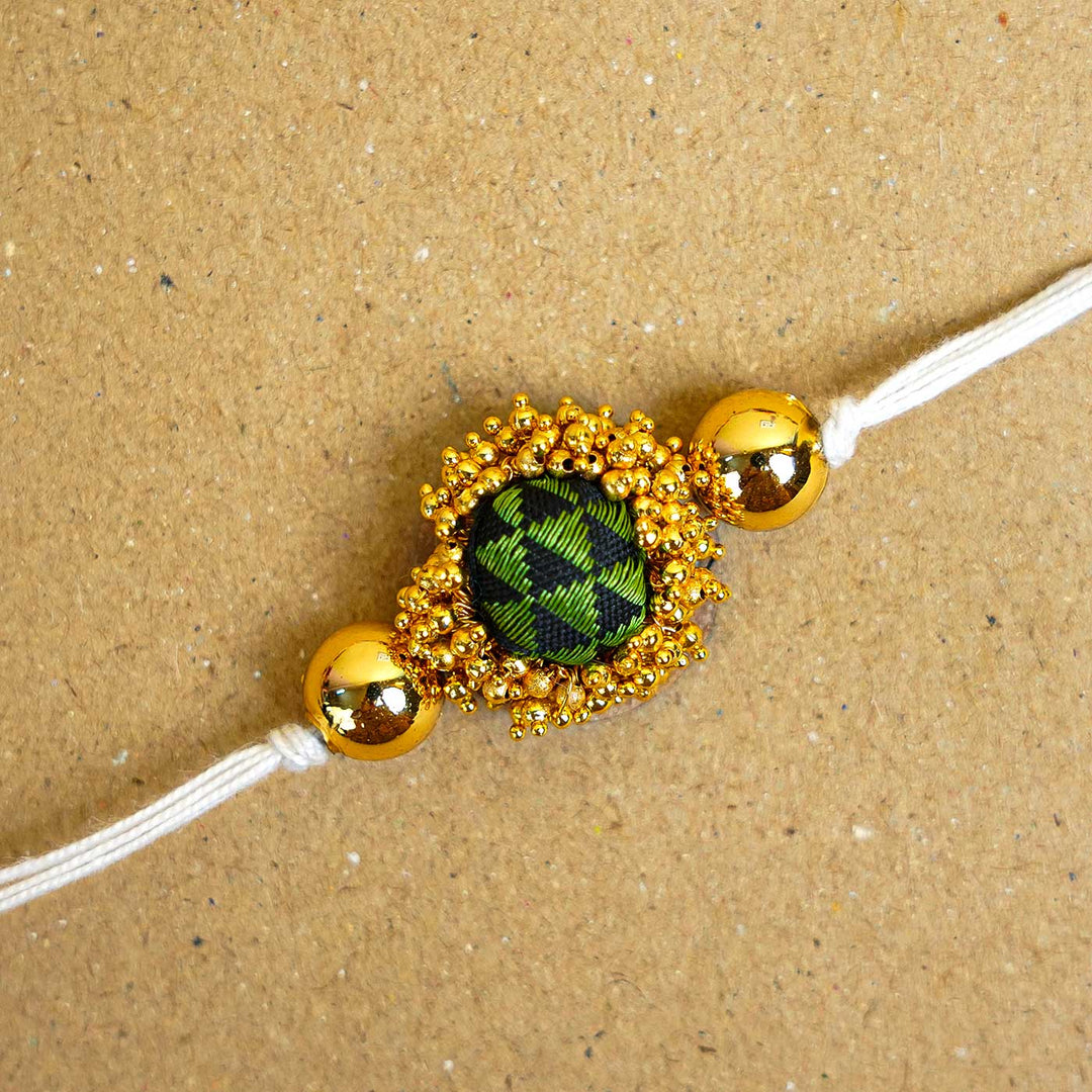 Handmade Green & Gold Fabric Rakhi With Roli Chawal