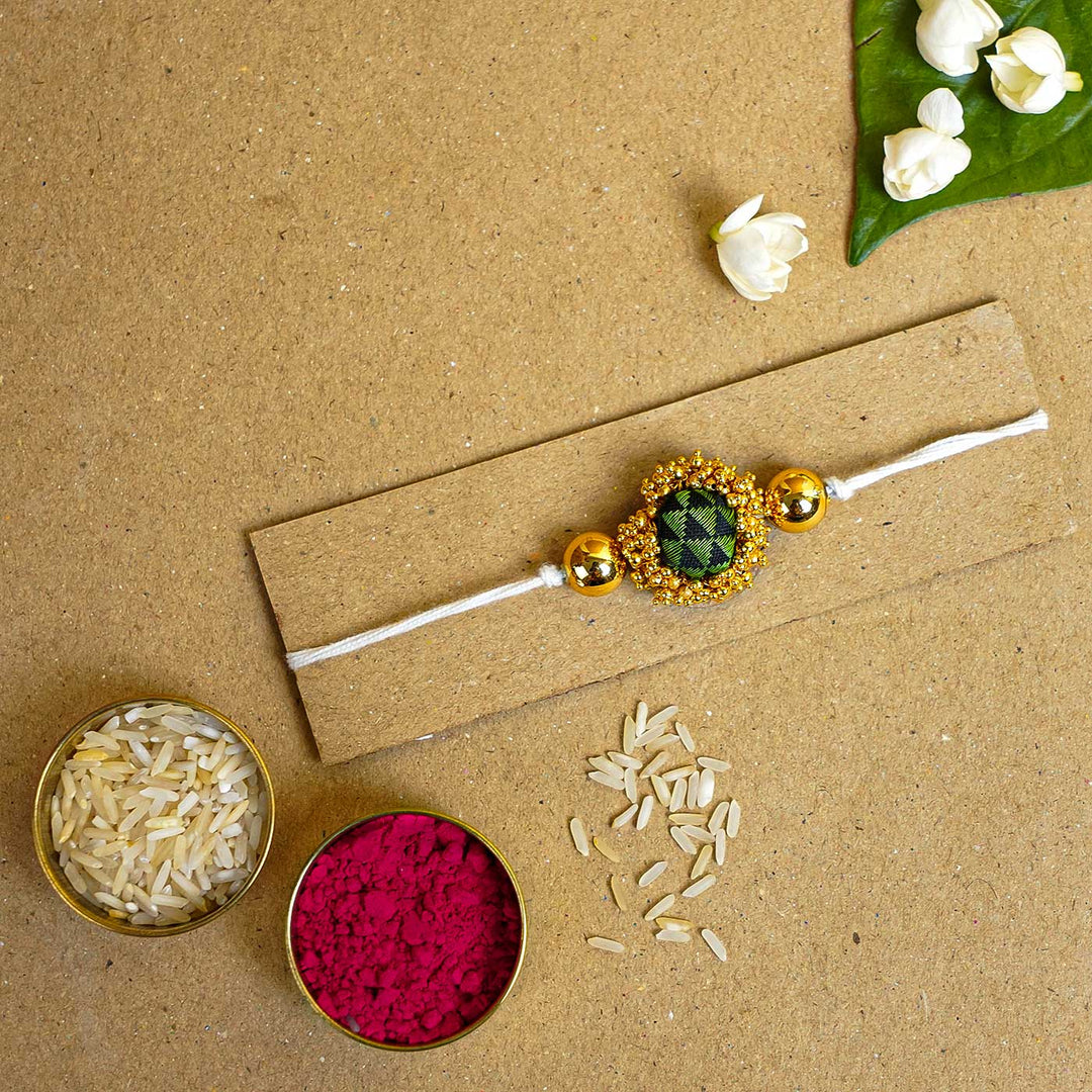 Handmade Green & Gold Fabric Rakhi With Roli Chawal