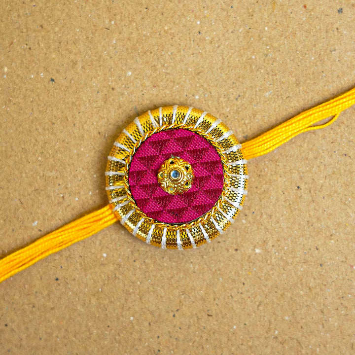 Handmade Pink & Maroon Round Fabric & MDF Rakhi With Roli Chawal