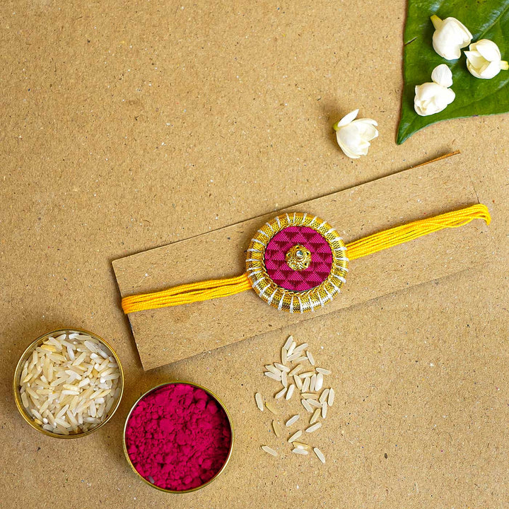 Handmade Pink & Maroon Round Fabric & MDF Rakhi With Roli Chawal