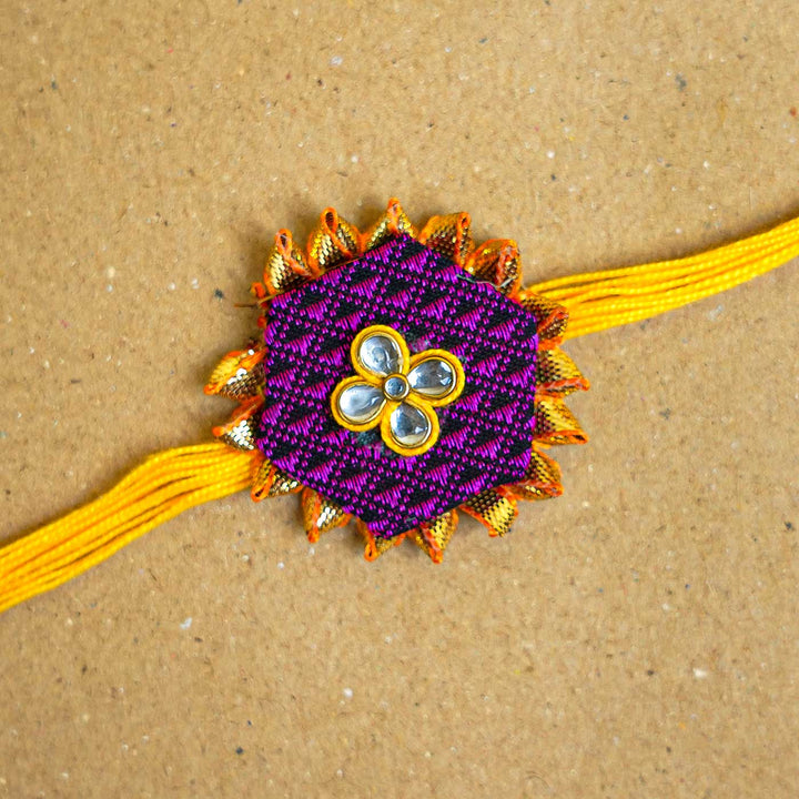 Handmade Purple Hexagon Fabric & MDF Rakhi With Roli Chawal