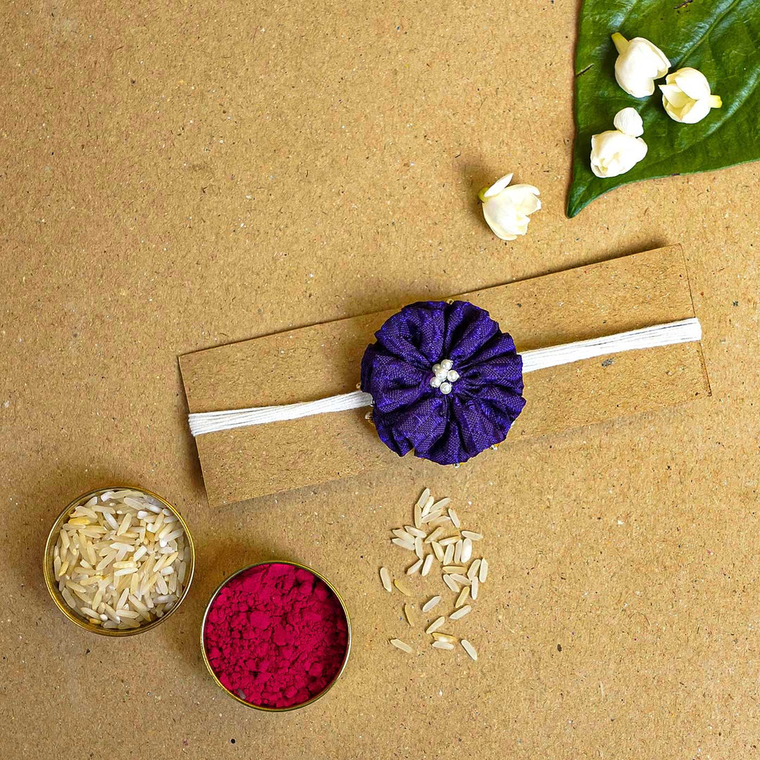 Handmade Purple Floral Fabric Rakhi With Roli Chawal