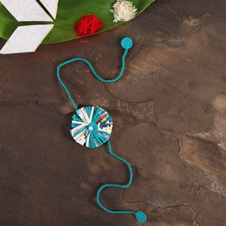 Handmade Ecofriendly Blue Recycled Paper Rakhi With Roli Chawal