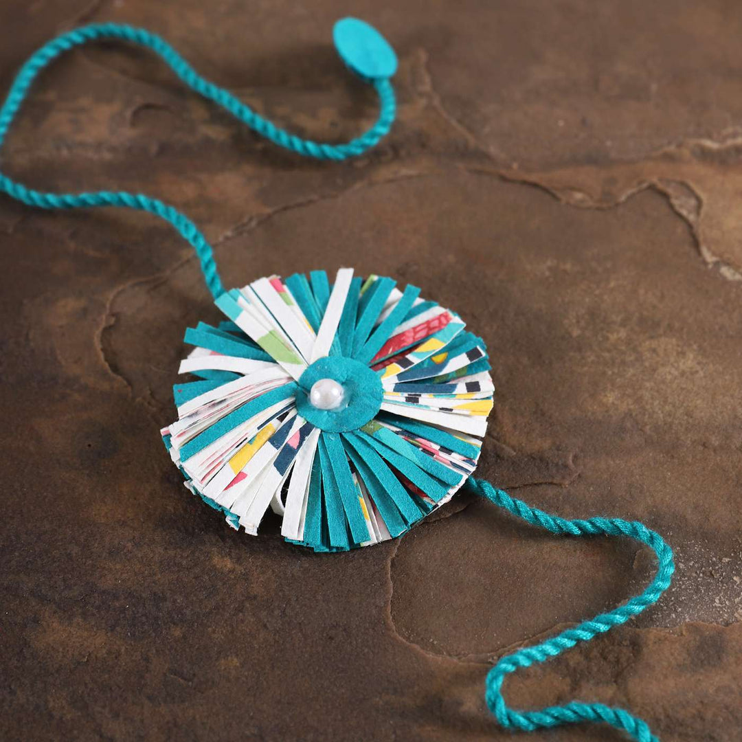 Handmade Ecofriendly Blue Recycled Paper Rakhi With Roli Chawal