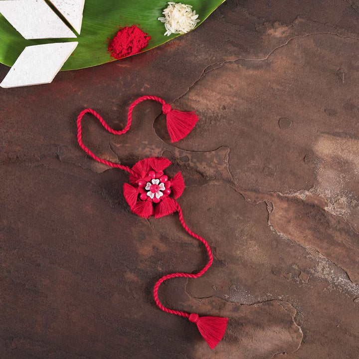 Handmade Beaded Red Tassel Flower Cotton Rakhi With Roli Chawal