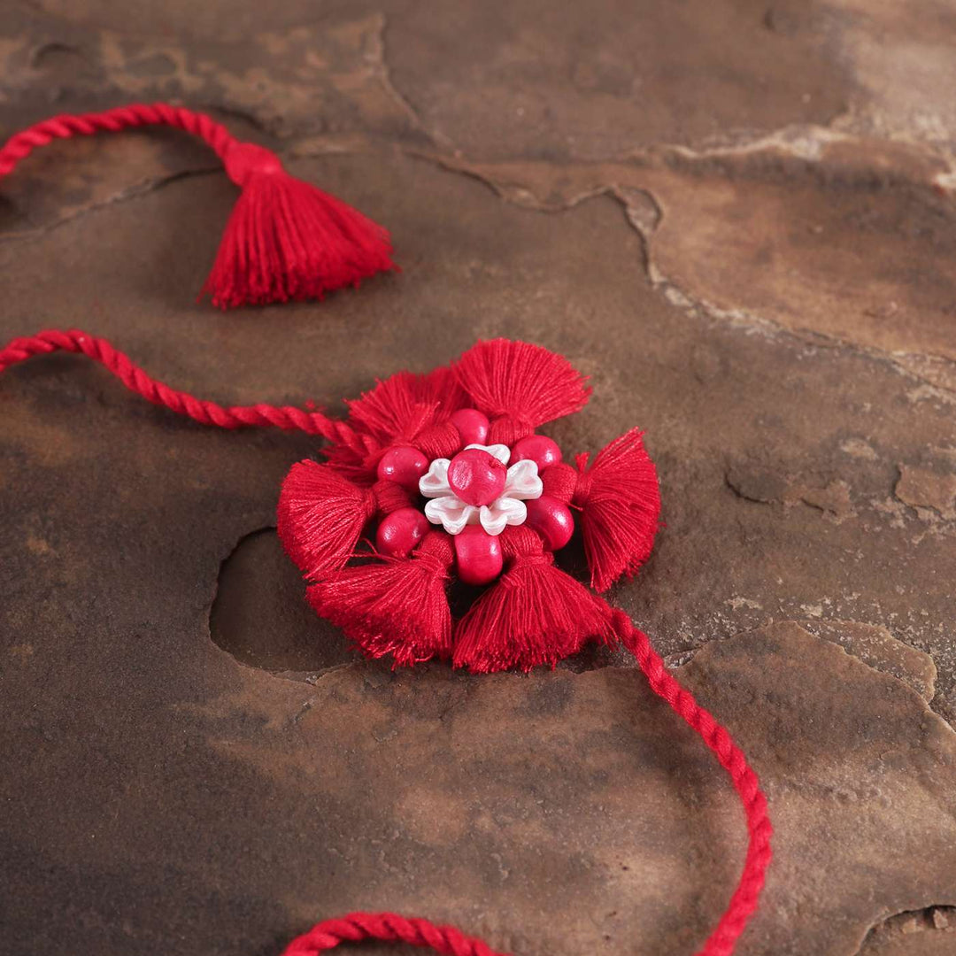 Handmade Beaded Red Tassel Flower Cotton Rakhi With Roli Chawal