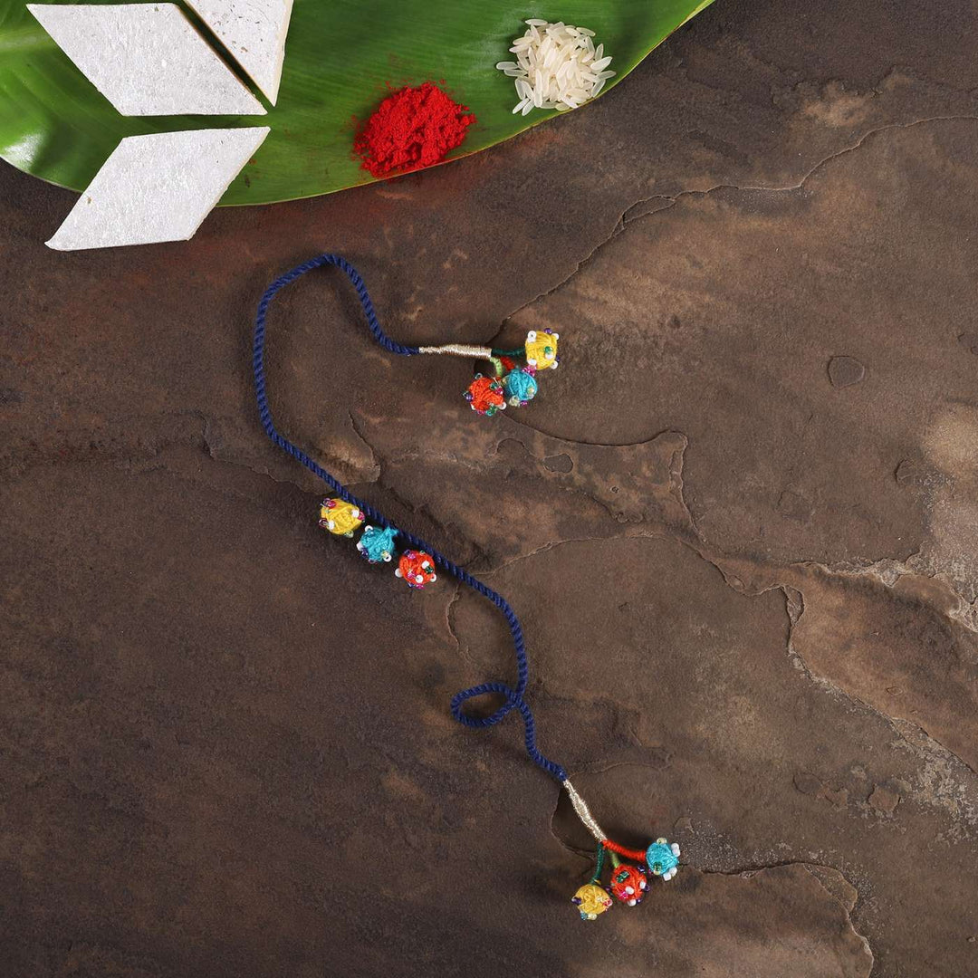 Handmade Beaded Dark Blue Dori Rakhi With Roli Chawal