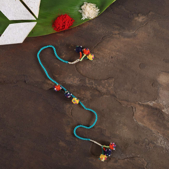 Handmade Beaded Light Blue Dori Rakhi With Roli Chawal