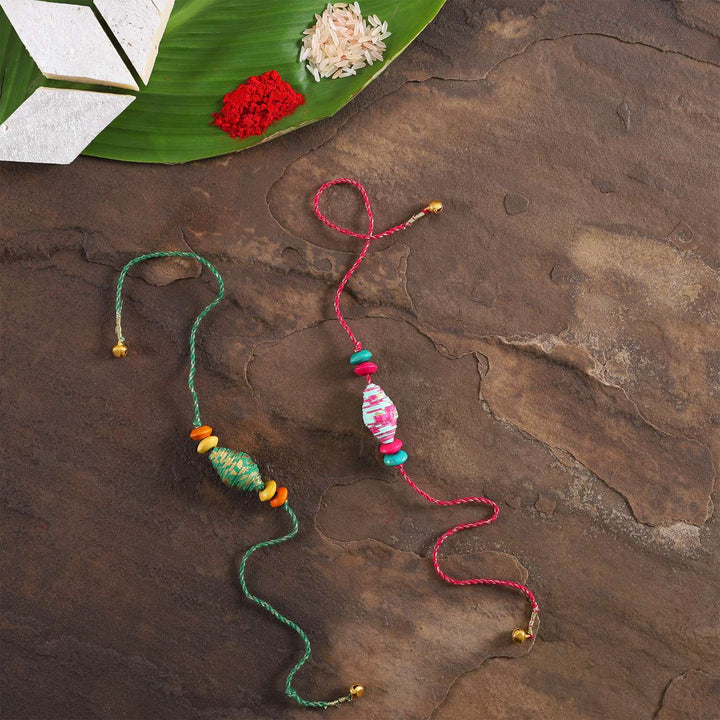 Handmade Beaded Paper Tubular Rakhi With Roli Chawal | Set of 2