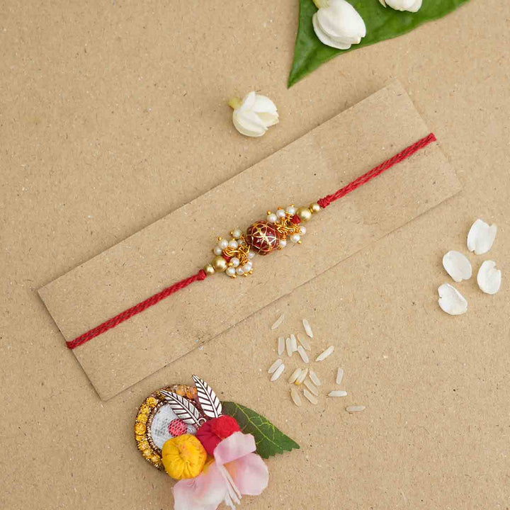 Handmade Red Meena Bead & Pearl Rakhi With Roli Chawal