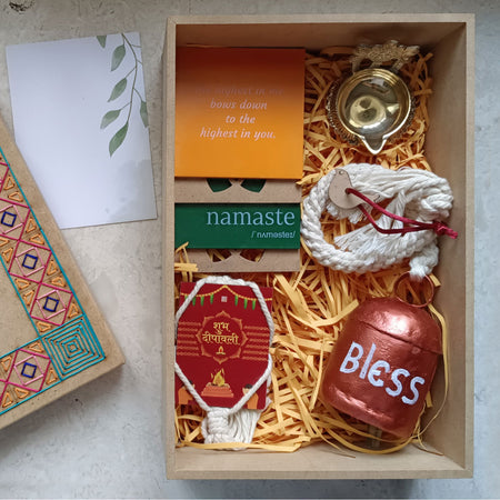 Send Ganesha Idol with Chocolates Hamper in Boat Shaped Basket Online -  DW22-108402 | Giftalove