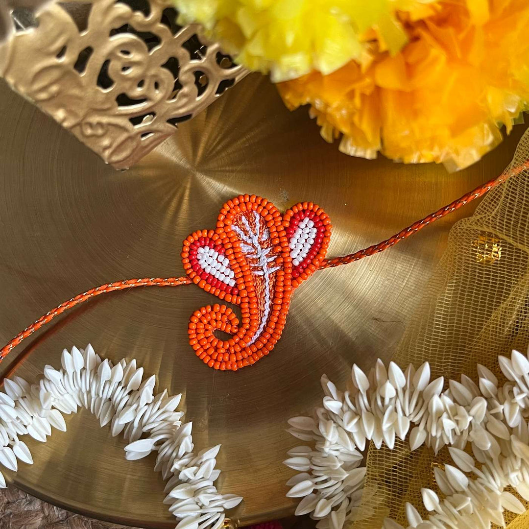 Handmade Beaded Ganpati Rakhi With Roli Chawal