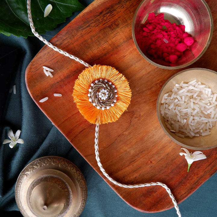 Handmade Zardozi Mustard & White Bead Work Rakhi With Wooden Box & Roli Chawal