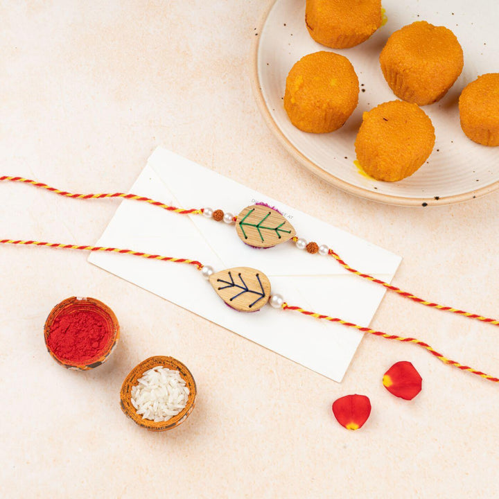 Handcrafted Bamboo Leaf-shaped Rakhi With Roli Chawal