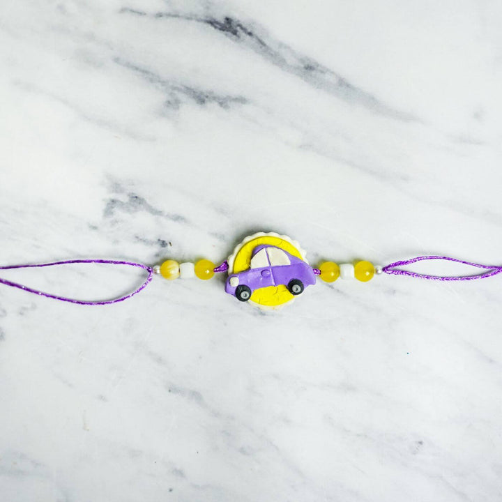 Handmade Porcelain Clay Themed Lumba Rakhi With Roli Chawal