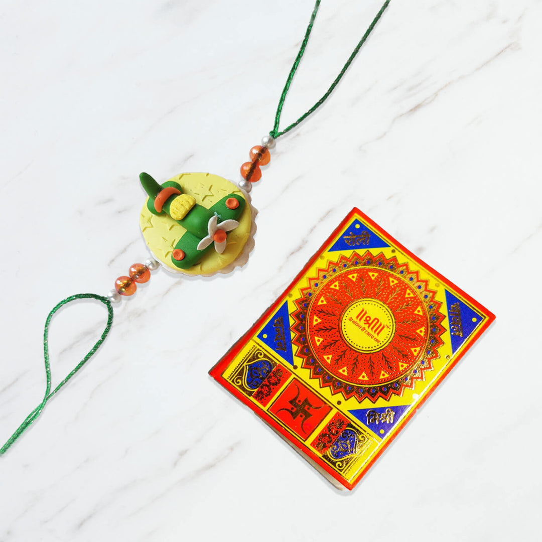 Handmade Porcelain Clay Themed Rakhi With Roli Chawal