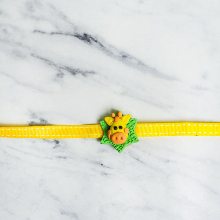 Handmade Porcelain Clay Themed Rakhi With Roli Chawal