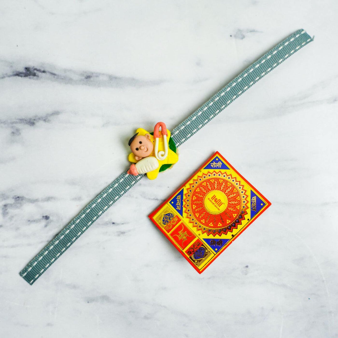 Handmade Porcelain Clay Themed Rakhi With Roli Chawal