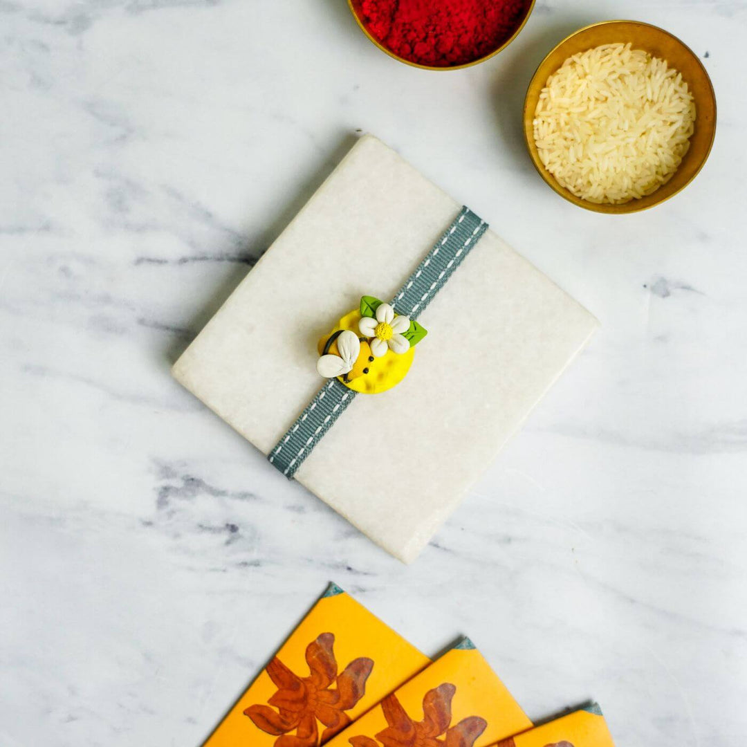 Handmade Porcelain Clay Themed Rakhi With Roli Chawal