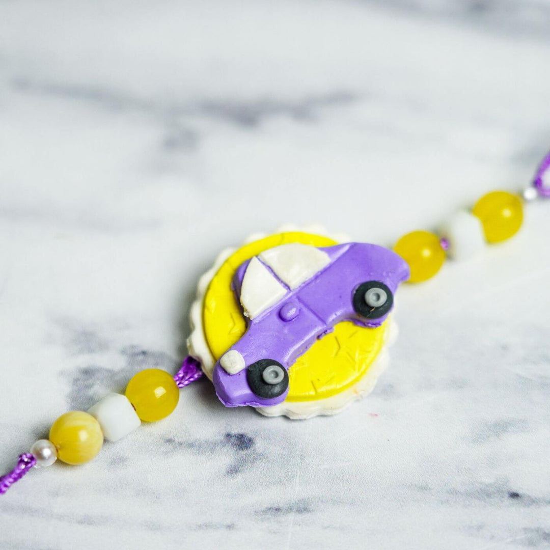 Handmade Porcelain Clay Themed Rakhi With Roli Chawal