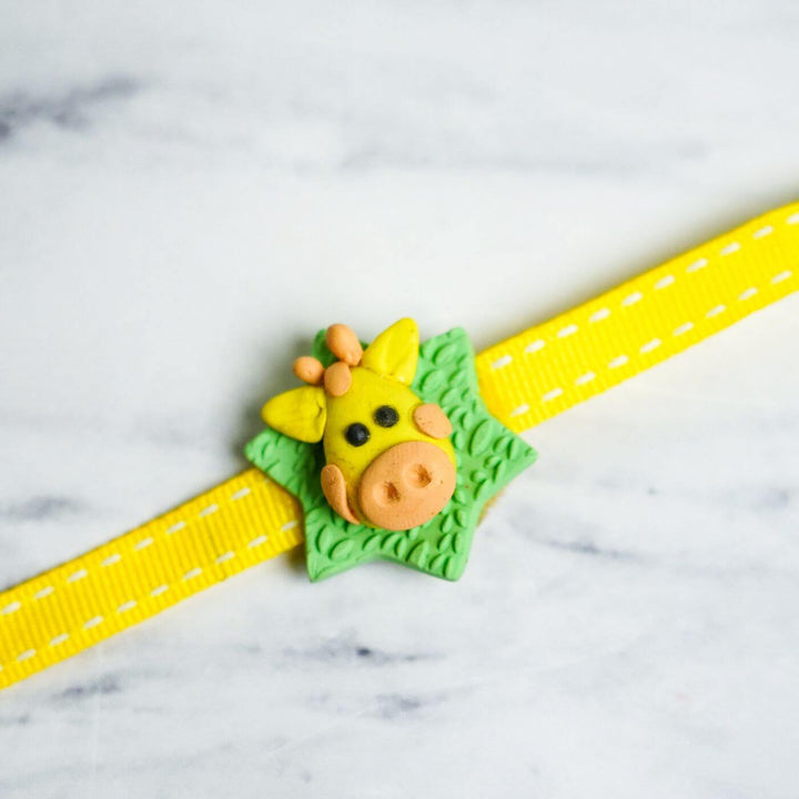 Handmade Porcelain Clay Themed Rakhi With Roli Chawal