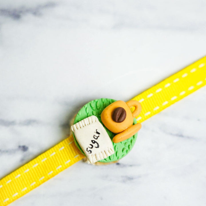 Handmade Porcelain Clay Themed Rakhi With Roli Chawal