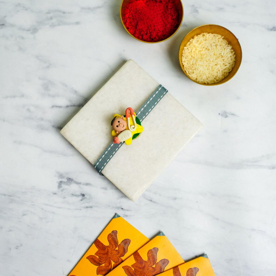 Handmade Porcelain Clay Themed Rakhi With Roli Chawal