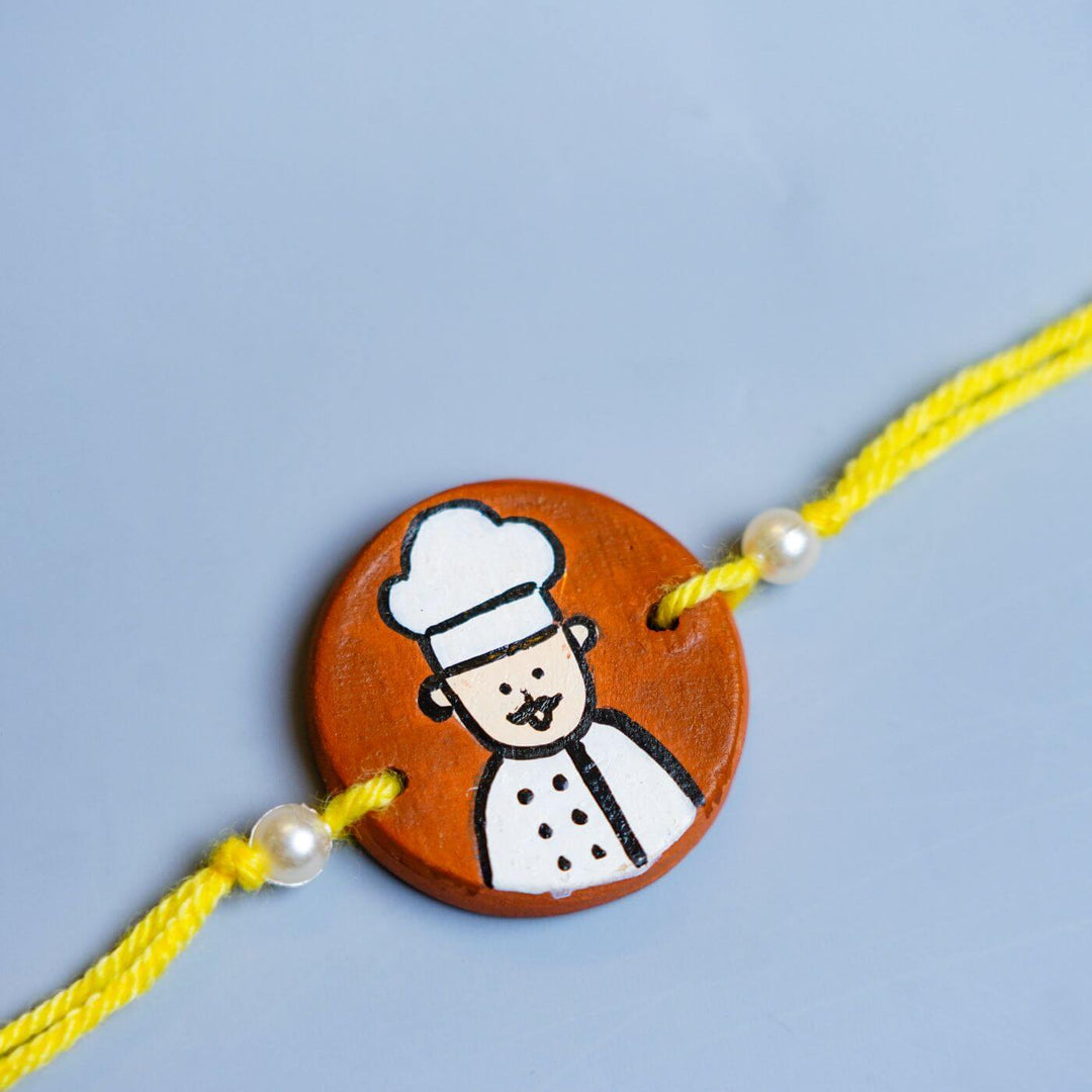 Personalized Chef Terracotta Rakhi With Roli Chawal