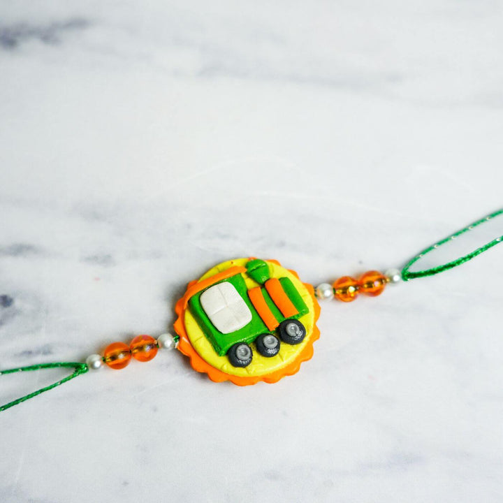 Handmade Porcelain Clay Themed Rakhi With Roli Chawal