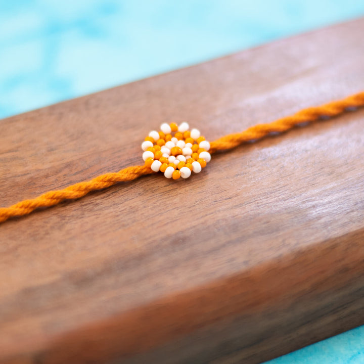 Hand Beaded Chaand Rakhi - Orange