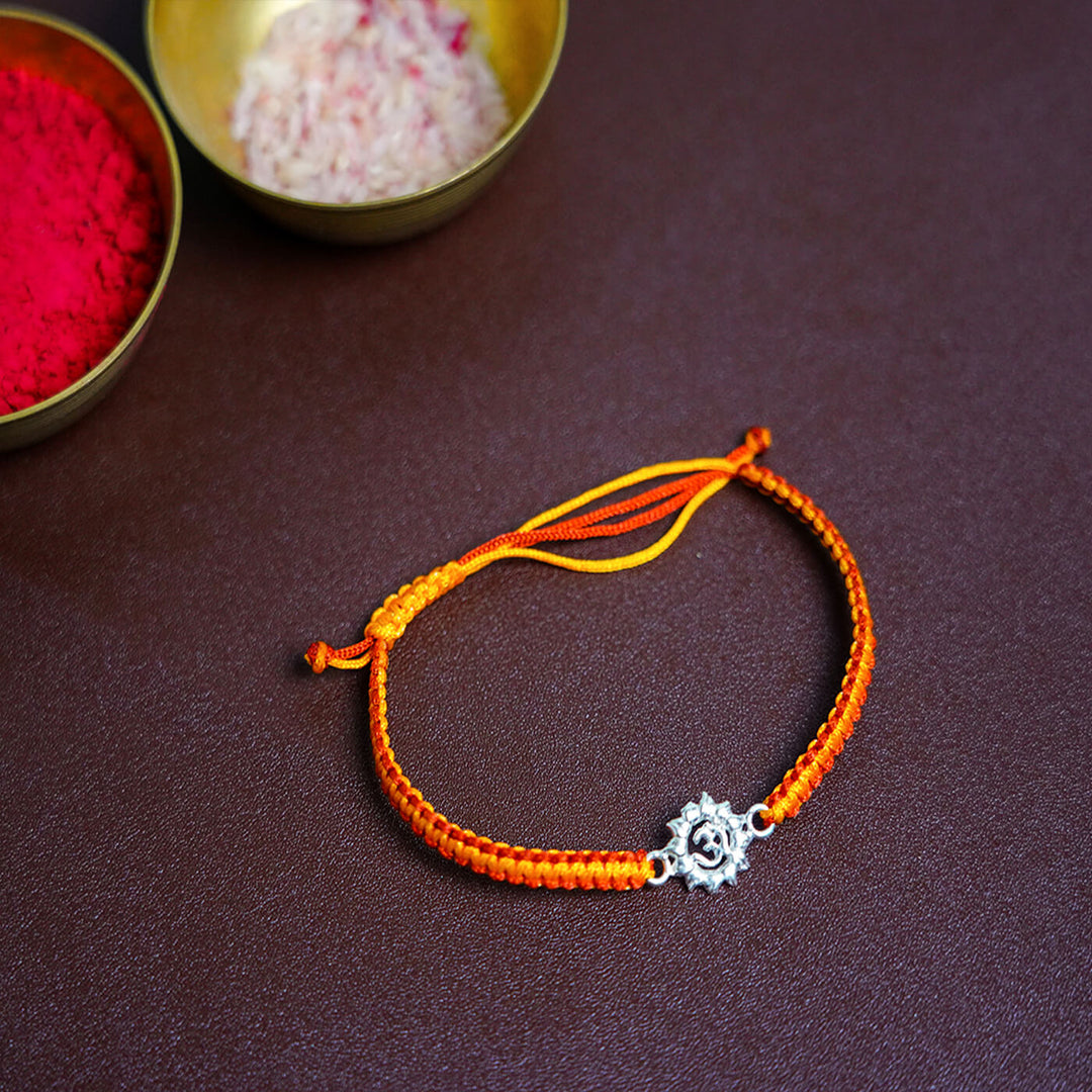 Handcrafted Silver Motif Adjustable Rakhi With Rice & Roli