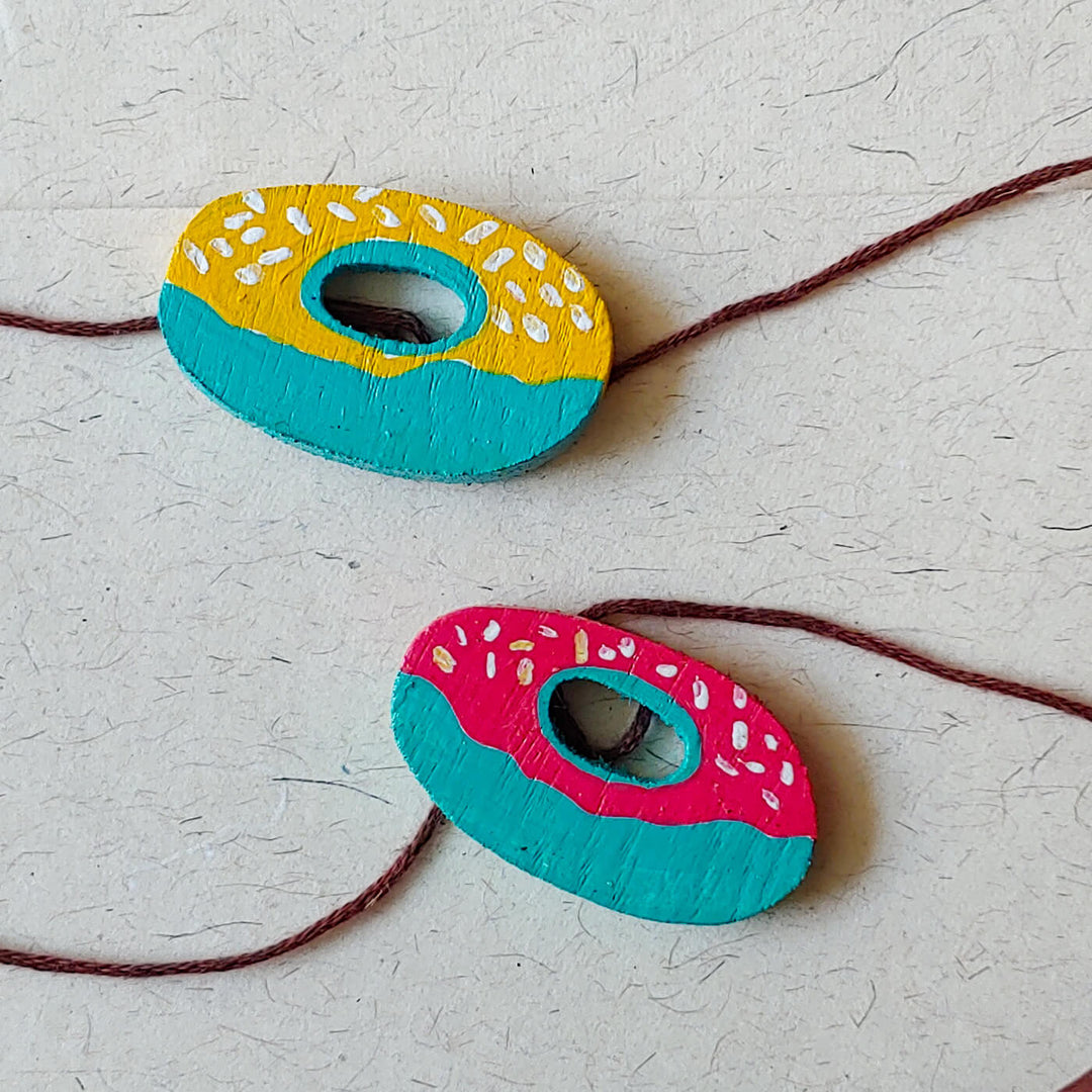 Handpainted Wooden Rakhi With Roli Chawal - Set of 2